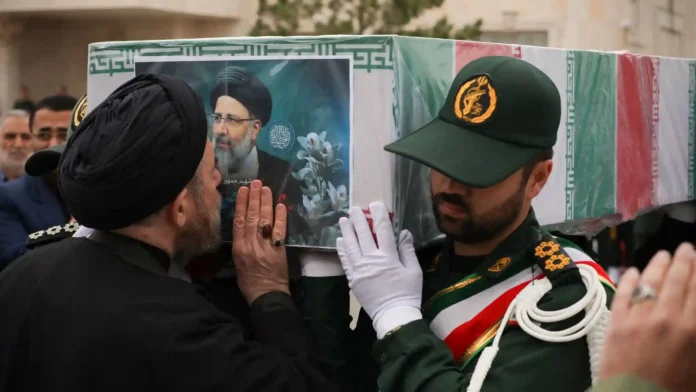 State television, as reported by AFP, broadcasted the somber gathering, showcasing the profound impact of Raisi’s death on the nation