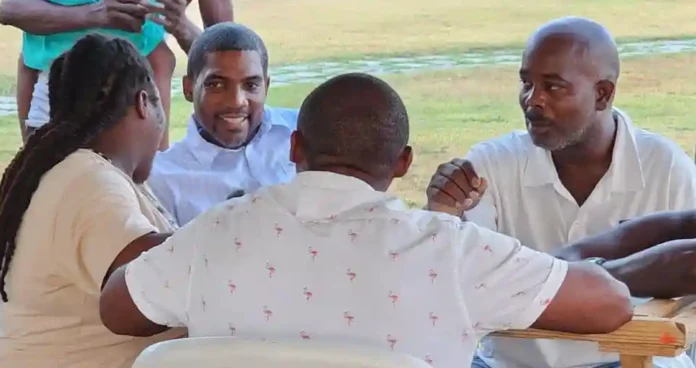 Prime Minister Dr. Terrance Drew with the members of constituency #8 at pre-Father's Day Chill