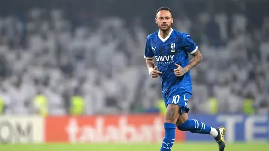 Al-Hilal's Brazilian forward #10 Neymar runs on the pitch during the AFC Champions League group B football match between UAE's Al-Ain and Saudi's Al-Hilal.(AFP)