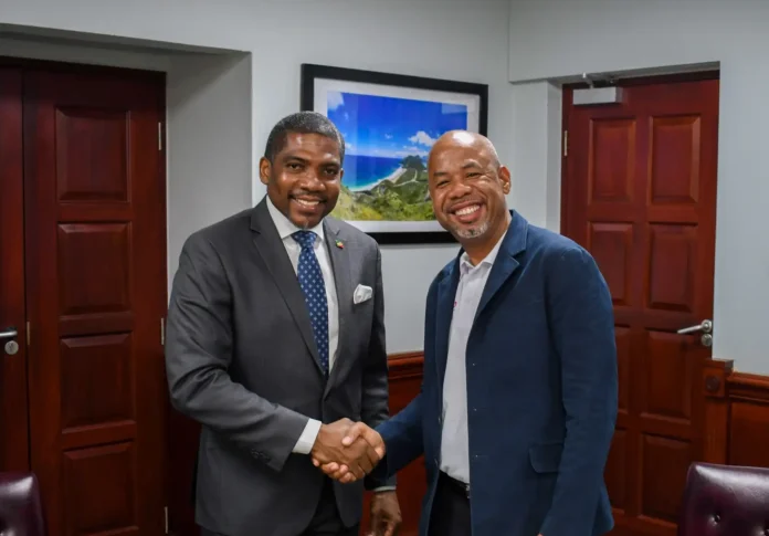 PM Dr. Terrance Drew meets Dr. Colin Young