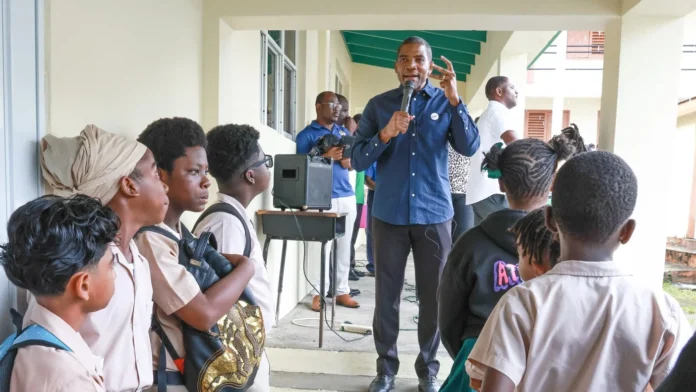 Prime Minister Dr. Terrance Drew while addressing school students on ASPIRE Financial Literacy Day in St. Kitts and Nevis
