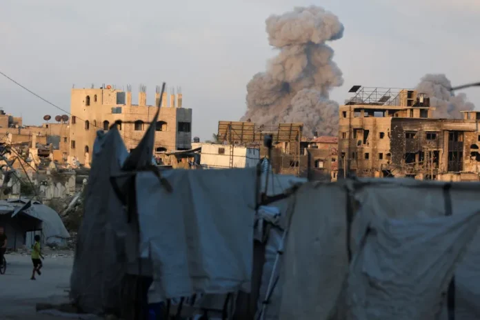 Palestinian families evacuate Gaza City neighborhoods under heavy bombardment as Israeli forces begin early stages of planned ground offensive