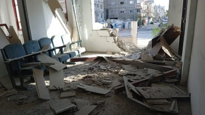 Fire and smoke engulf the PRCS headquarters in Khan Younis after an alleged Israeli strike killed one staff member
