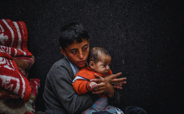 Displaced families in Gaza queue for scarce food aid as famine deepens, leaving children and elderly most at risk