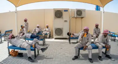 Workers take rest in shaded, air-conditioned shelters during the UAE’s midday break initiative, ensuring safety from extreme summer heat