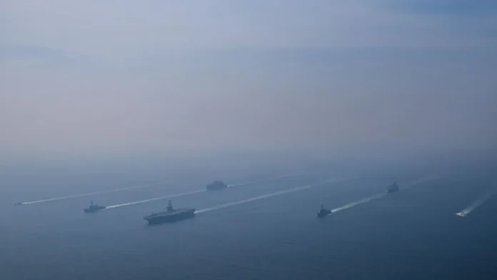 Iran nears a deal with China for CM-302 supersonic anti-ship missiles as US carrier groups deploy nearby, raising regional tensions and escalating strategic risks