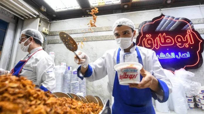 Dimmed Cairo streets reflect Egypt’s energy-saving measures as businesses close early amid rising fuel costs and regional conflict pressures